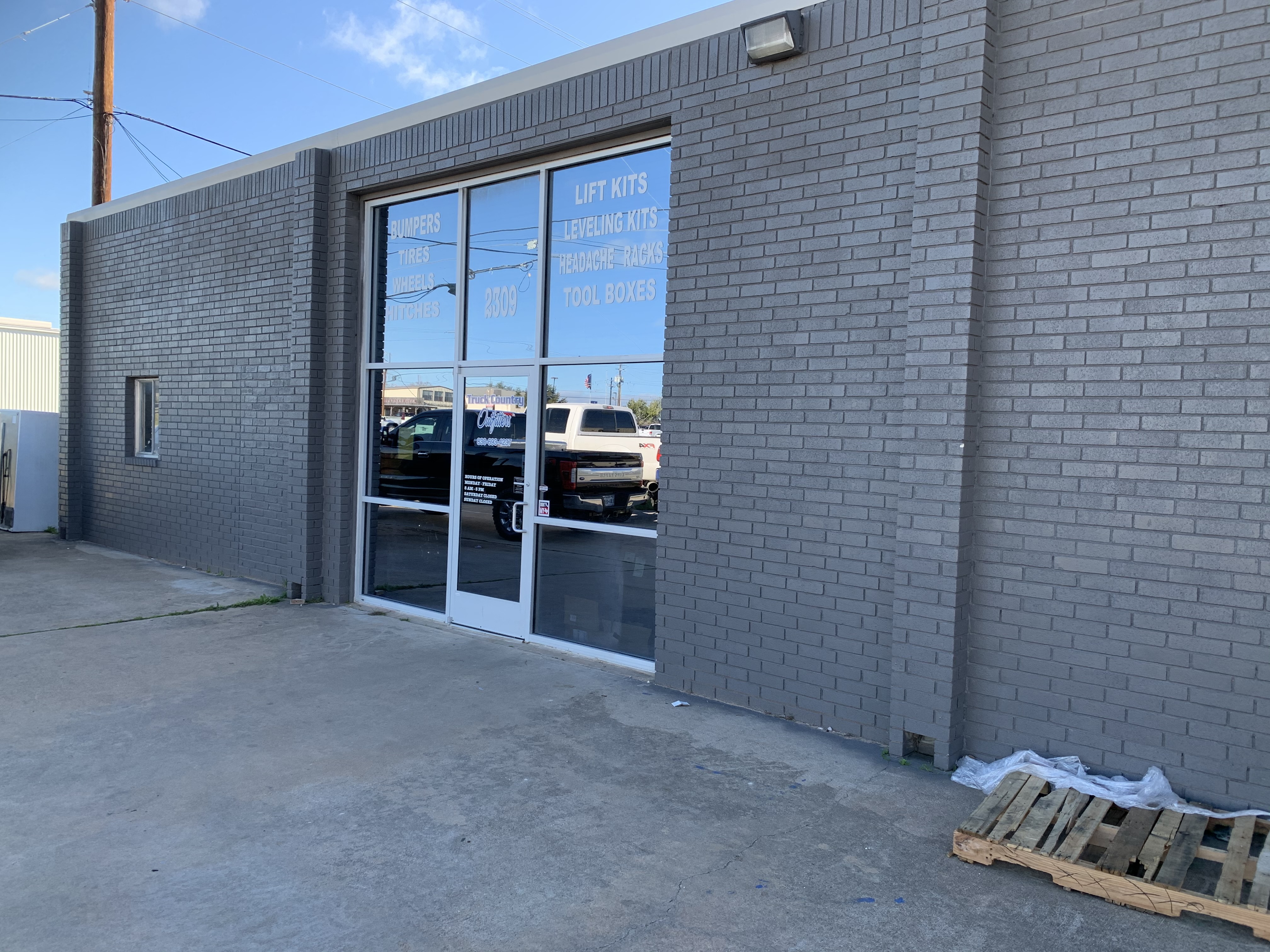 Truck Country Outfitters storefront at 2309 Commerce St, Marble Falls TX — lift kits, leveling kits, headache racks, tires, wheels, bumpers, hitches