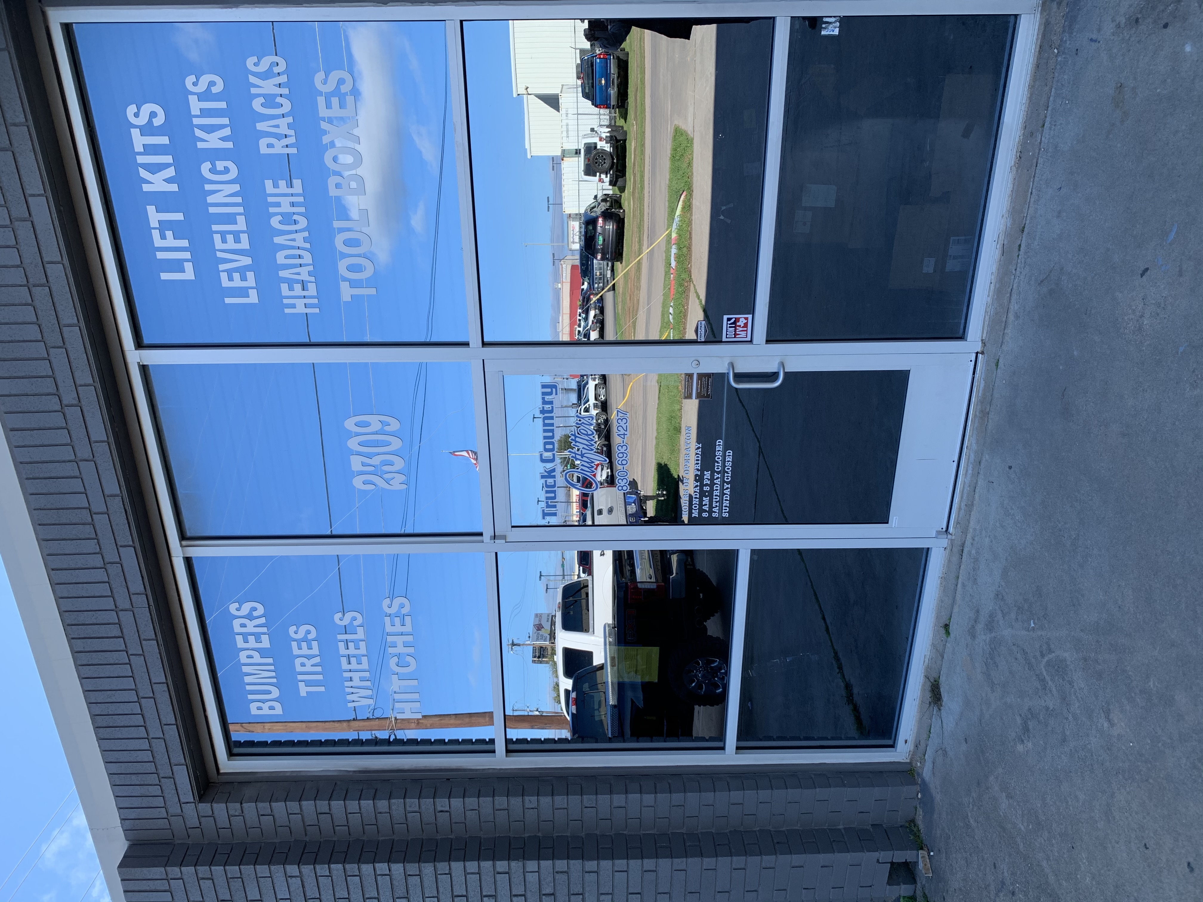 Truck Country Outfitters storefront — 2309 Commerce St, Marble Falls TX 78654 — lift kits, leveling kits, headache racks, tires, wheels